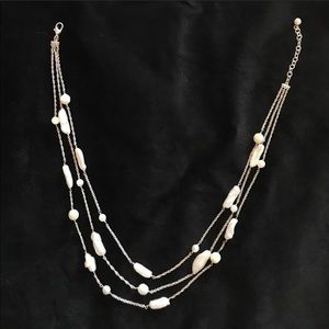 3 strand pearl necklace.